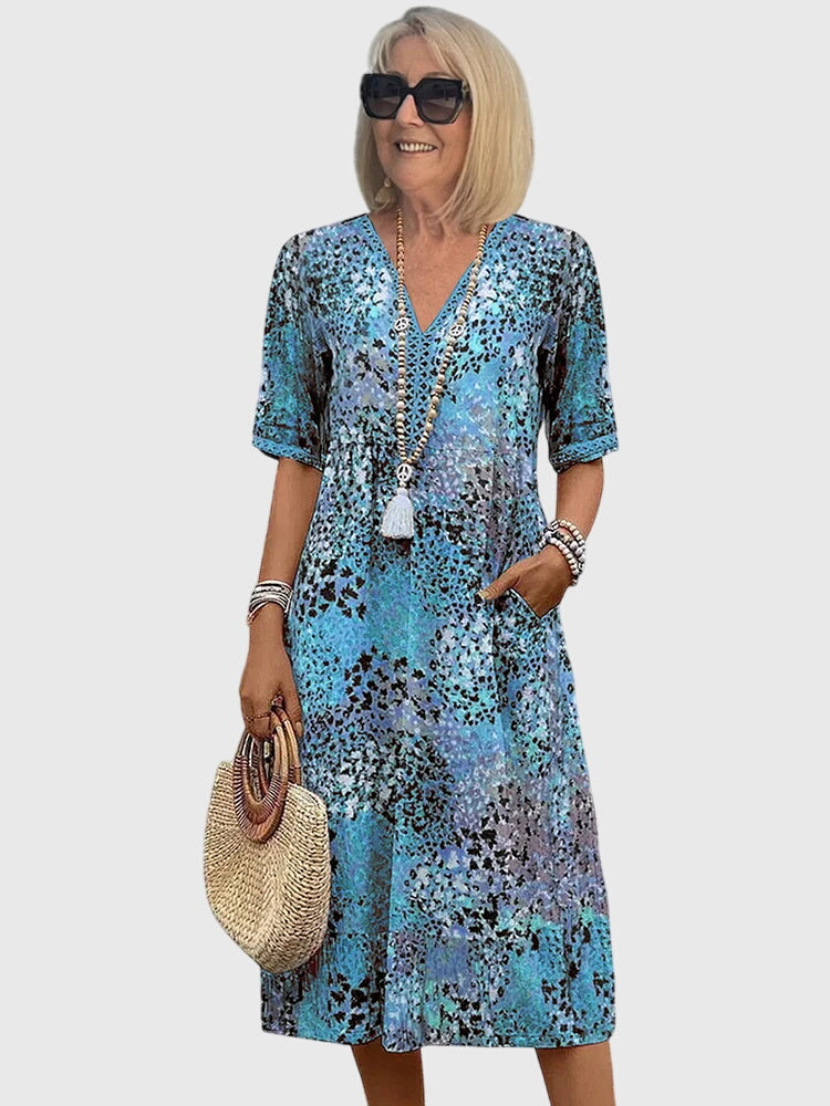 Bella | Elegantes Blumen-Midi-Kleid