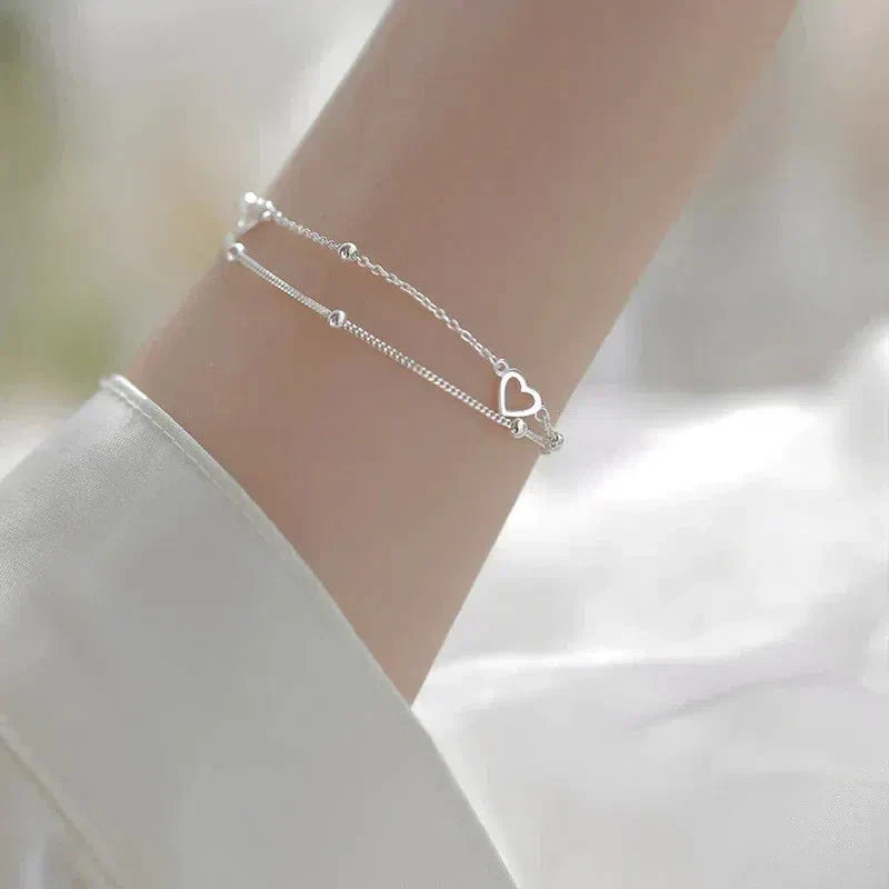 Verstellbares Herzarmband aus Silber