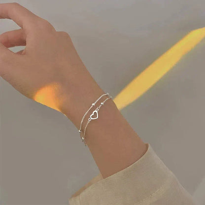 Verstellbares Herzarmband aus Silber