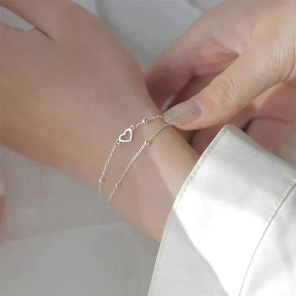 Verstellbares Herzarmband aus Silber